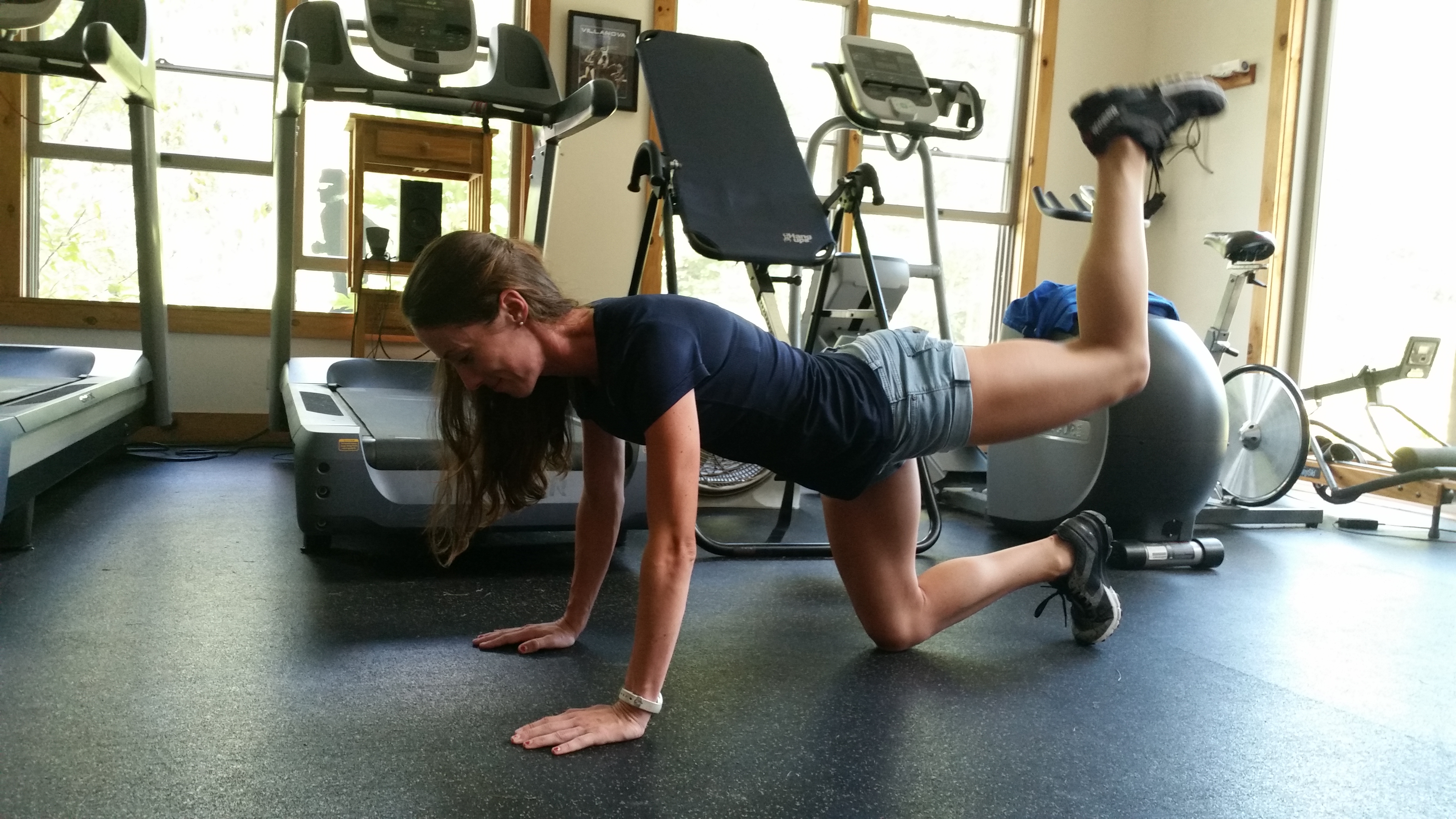 Coach Sarah Crouch demonstrating strength exercises